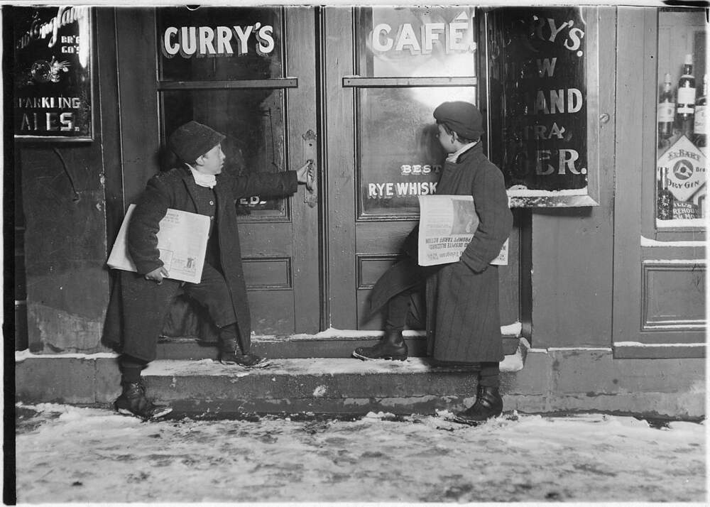 A common case of team work. Smaller boy, Joseph Bishop, goes into saloons and sells his last paper. Then comes out... - NARA - 523168